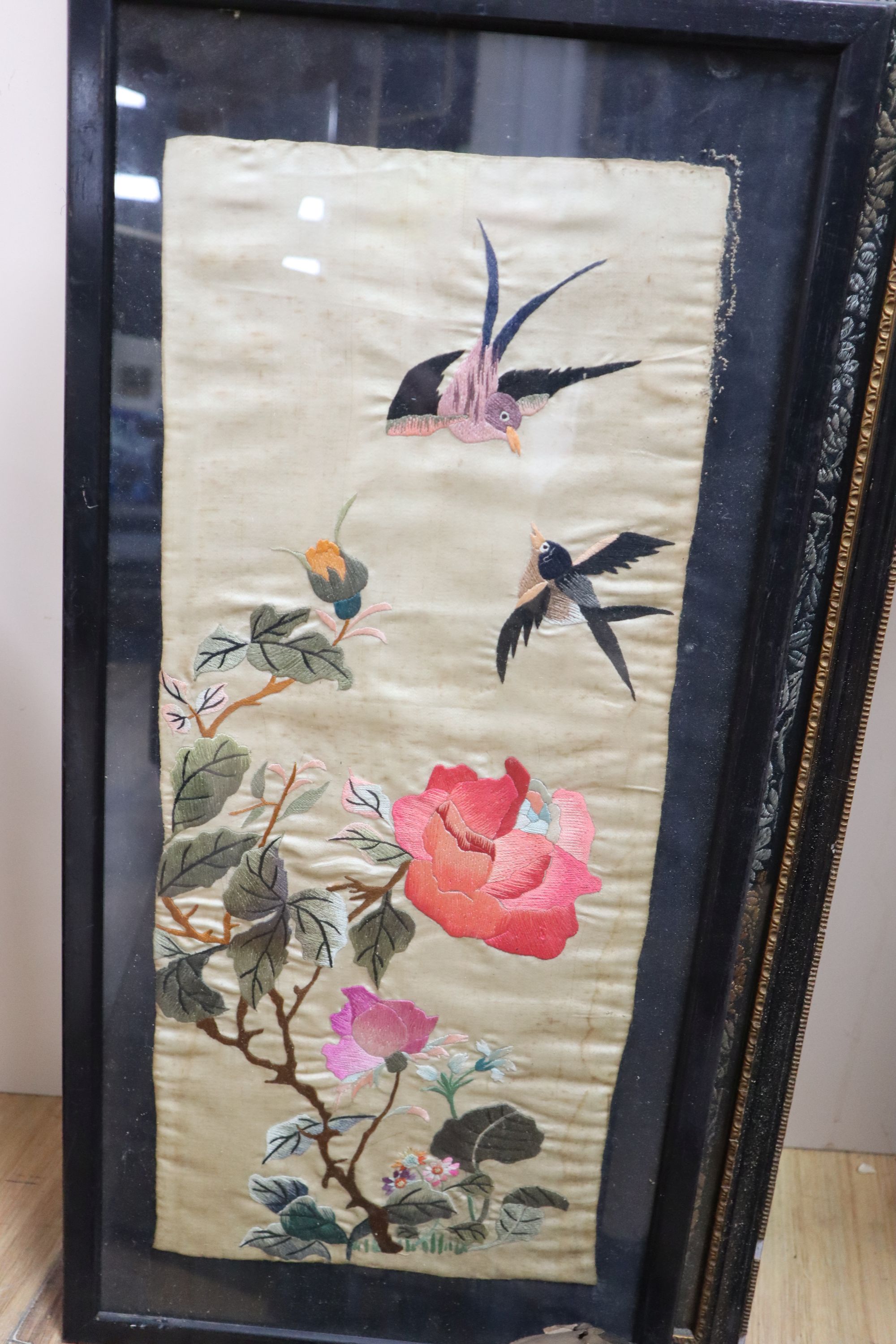 Three Chinese embroidered silk landscape panels and another woven with birds and flowers, 20th century